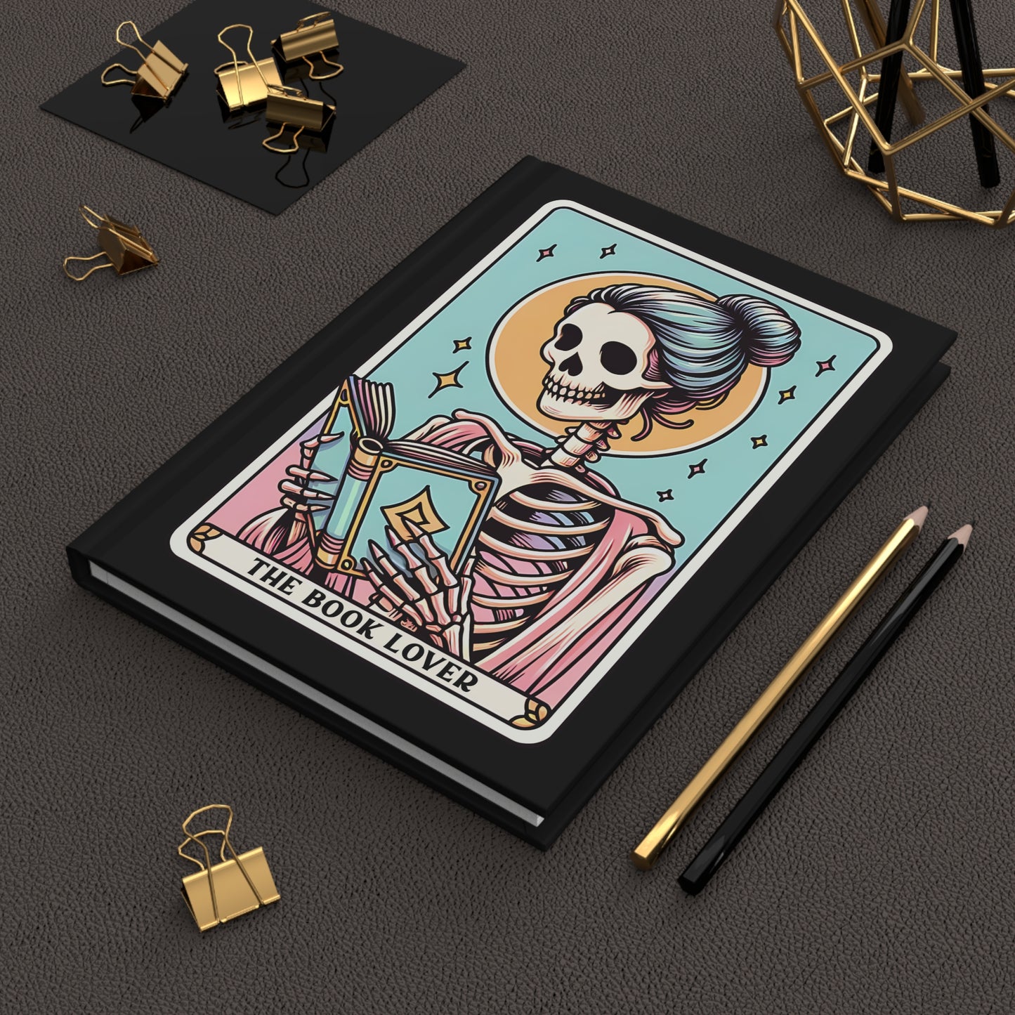 150 page Hardcover Journal for reading lovers. Includes a Tarot Card themed graphic for "The Book Lover" with a skeleton reading - front and back cover print. Lined, blank, perforated pages - makes a cute gift for bookish girlfriends, teachers, English majors, and avid readers.