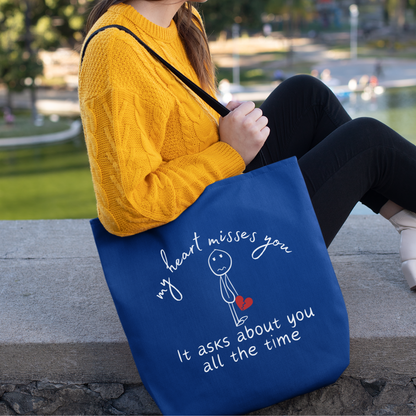 Blue tote bag with a poignant message for a friend or family member who is grieving. This bag serves as a loving tribute to the continued love that surpasses separation, or even death. 