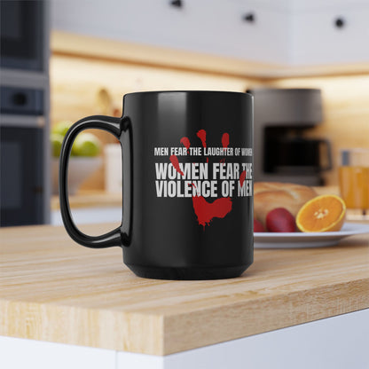 Black coffee mug 15 ounces, with a red handprint and the strongly anti-violence message: Men Fear the Laughter of Women. Women Fear the Violence of Men.  Ideal gift for survivors of domestic violence, support groups, therapists and counselors. 