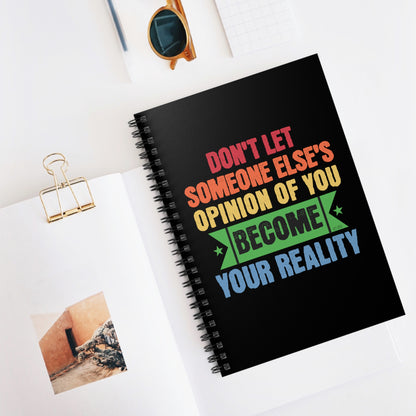 Black spiral notebook with the powerful message: Don't Let Someone Else's Opinion of You Become Your Reality. 