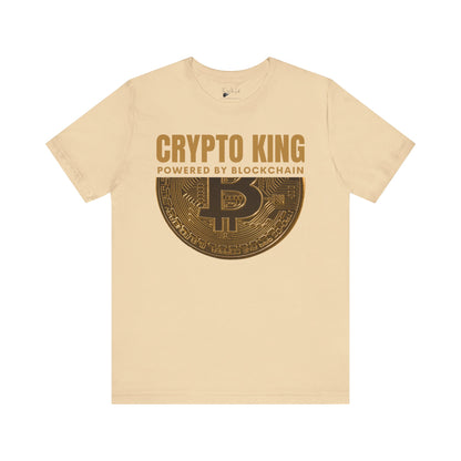 Soft Cream Crypto King Bella Canvas 3001 T-shirt with a large gold Bitcoin graphic - "Powered By Blockchain". Perfect gift for men in finance, crypto currency investors, team Satoshi and Saylor supporters, anyone who believes the future of banking is in digital currency.