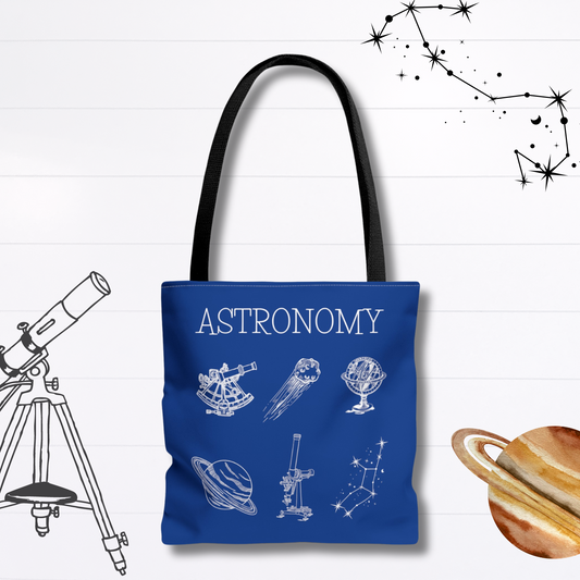 Cosmic tote with an astronomy theme that focuses on magical studies. Tote bag is blue and has a black handle.