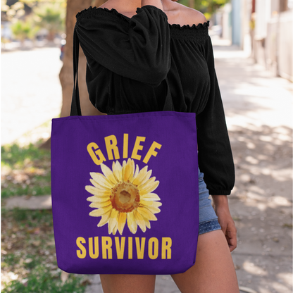 Purple tote bag with the message: Grief Survivor and a sunflower graphic. Serves as a reminder that while you are grieving a great loss, you are resilient. Thoughtful sympathy gift.