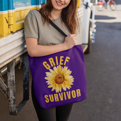 Purple Grief Survivor tote bag. Excellent for carrying those important documents, when you are handling the details of a lost loved one. Or simply a carryall for daily errands or school books, with a message to inspire and uplift you during a difficult time of loss.
