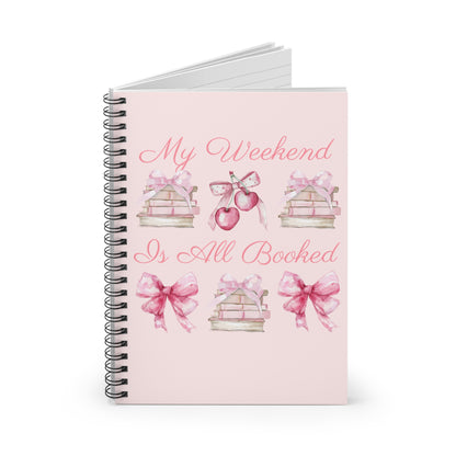 Pink "My Weekend Is All Booked" coquette style spiral notebook. Has blank, lined pages and is a perfect gift for book lovers, bibliophiles, and librarians. Take school notes, make TBR lists, and so much more.