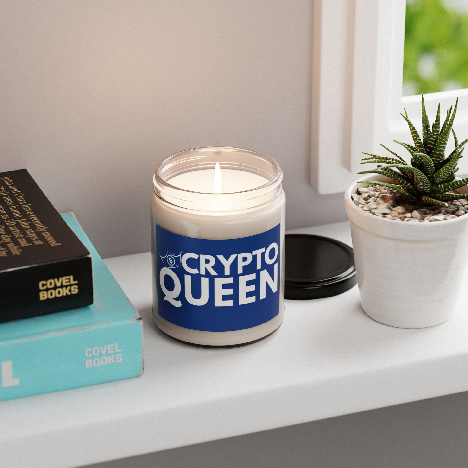 9 oz reusable glass jar candle that says "Crypto Queen" with a Bitcoin crown. Blue Label with white font. Makes a great gift or housewarming present for women in finance, digital banking, and Bitcoin/Crypto Currency enthusiasts.