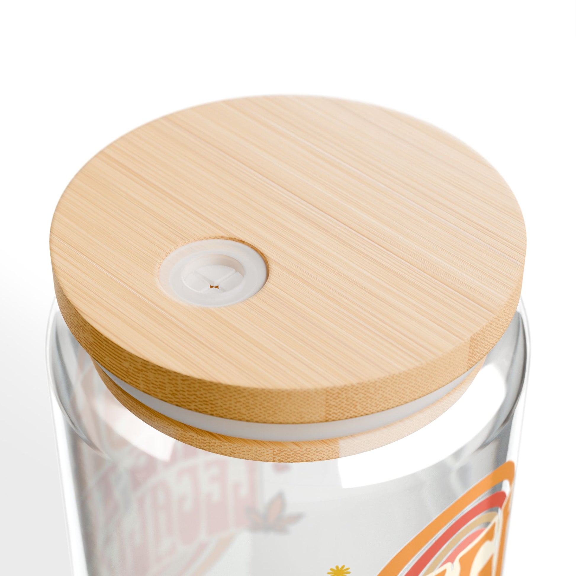 Bamboo gasket-push lid on a glass sipper cup.