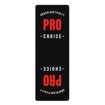 Black yoga mat with the words: Unapologetically Pro-choice. Express your unwavering stance with our "Unapologetically Pro-choice" yoga mat. Designed for durability and comfort, it's perfect for those who practice with purpose.