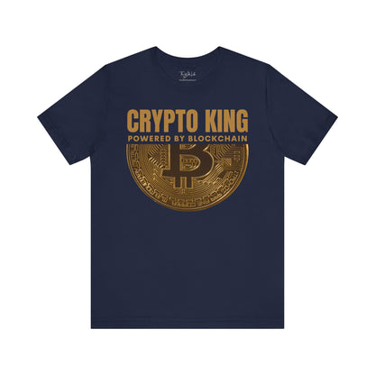 Navy Crypto King Bella Canvas 3001 T-shirt with a large gold Bitcoin graphic - "Powered By Blockchain". Perfect gift for men in finance, crypto currency investors, team Satoshi and Saylor supporters, anyone who believes the future of banking is in digital currency.