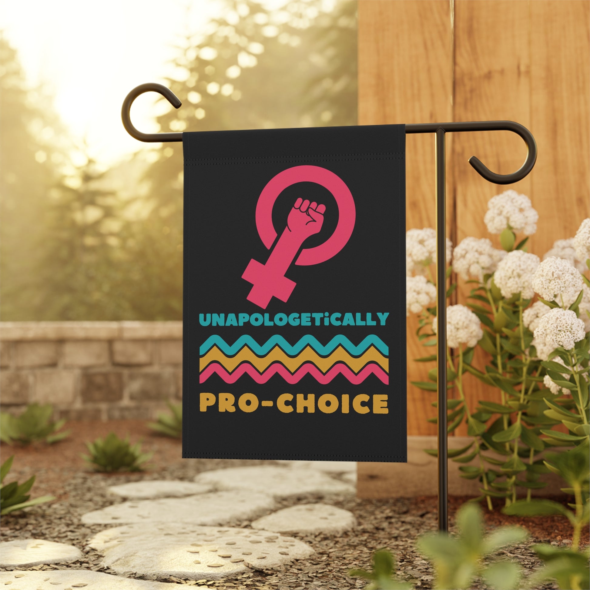 Unique garden flag gift idea for activist or abortion ally. "Unapologetically Pro-Choice" garden flag with black background and resist graphic. 12" x 18" yard decor.