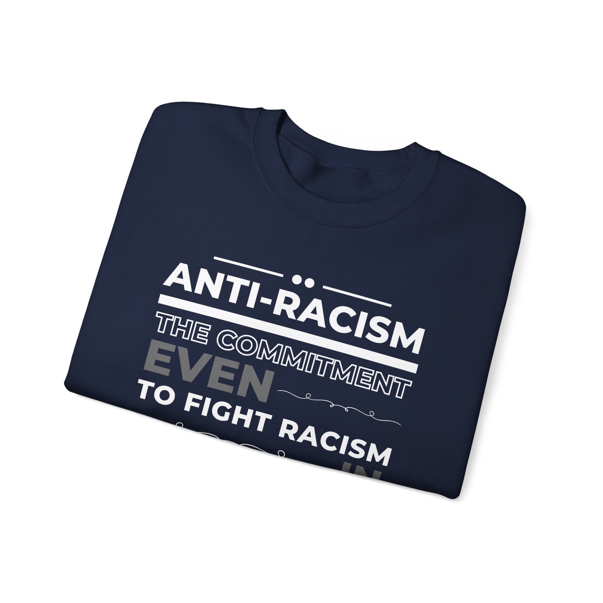 Navy Gildan 18000 Sweatshirt with a strong anti-racism message: The commitment to fight racism wherever we find it, even in ourselves.