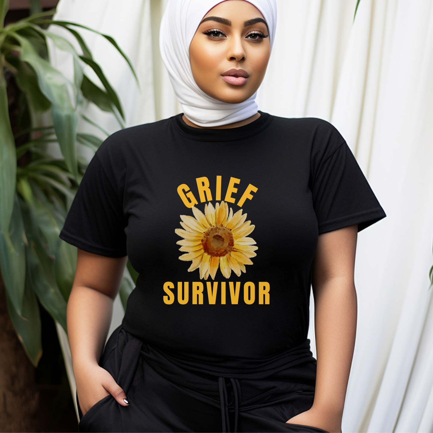 Black Bella Canvas 3001 t-shirt with Grief Survivor and graphic sunflower design. A beautiful way to honor resilience and personal strength.