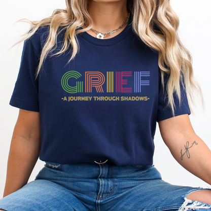 Navy Bella Canvas 3001 Grief t-shirt. Retro design with the words: Grief, A Journey Through Shadows