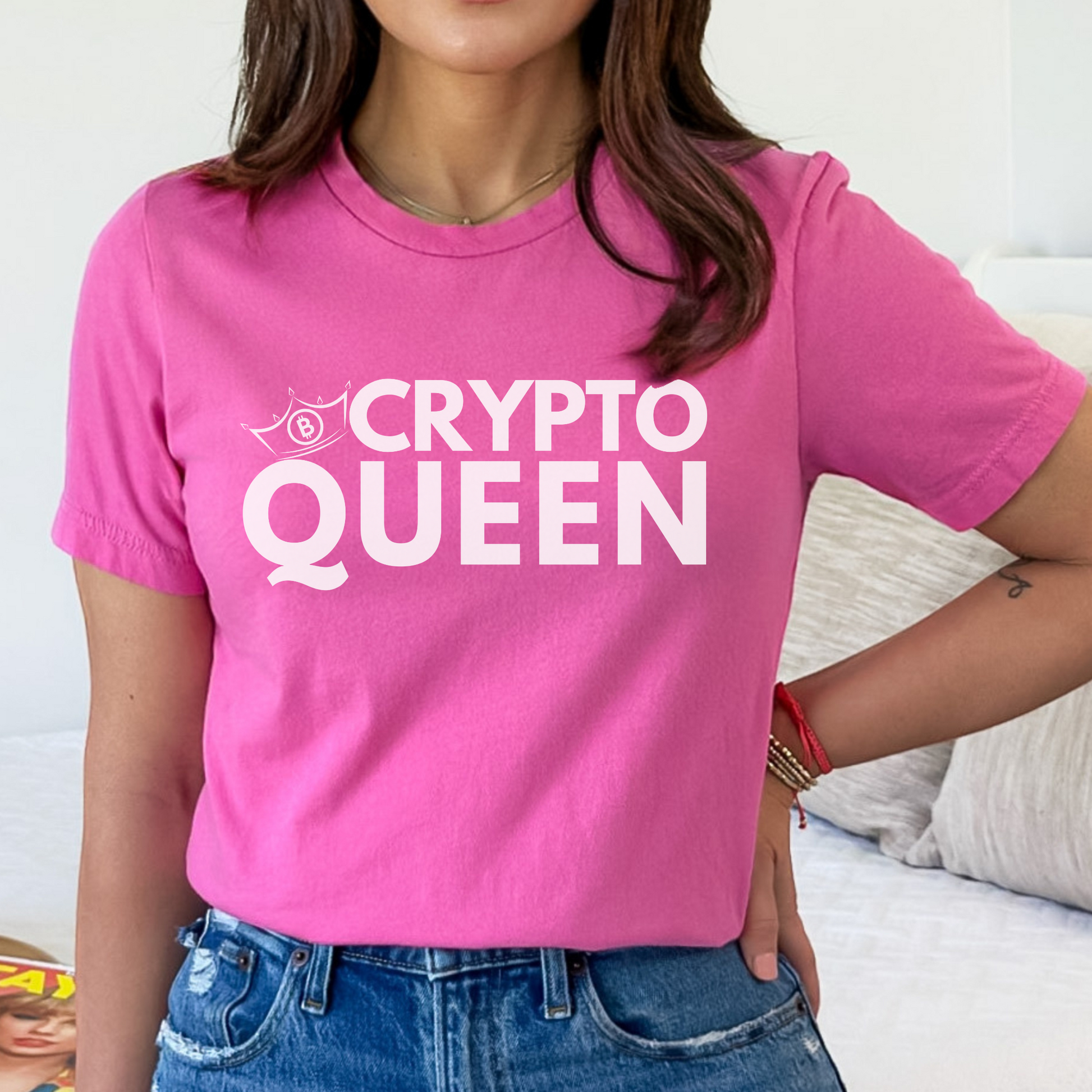 Charity Pink Bella Canvas 3001 T-shirt that says "Crypto Queen" with a crown and bitcoin symbol. It's the perfect gift for women in finance, supports of blockchain technology, and crypto currency.