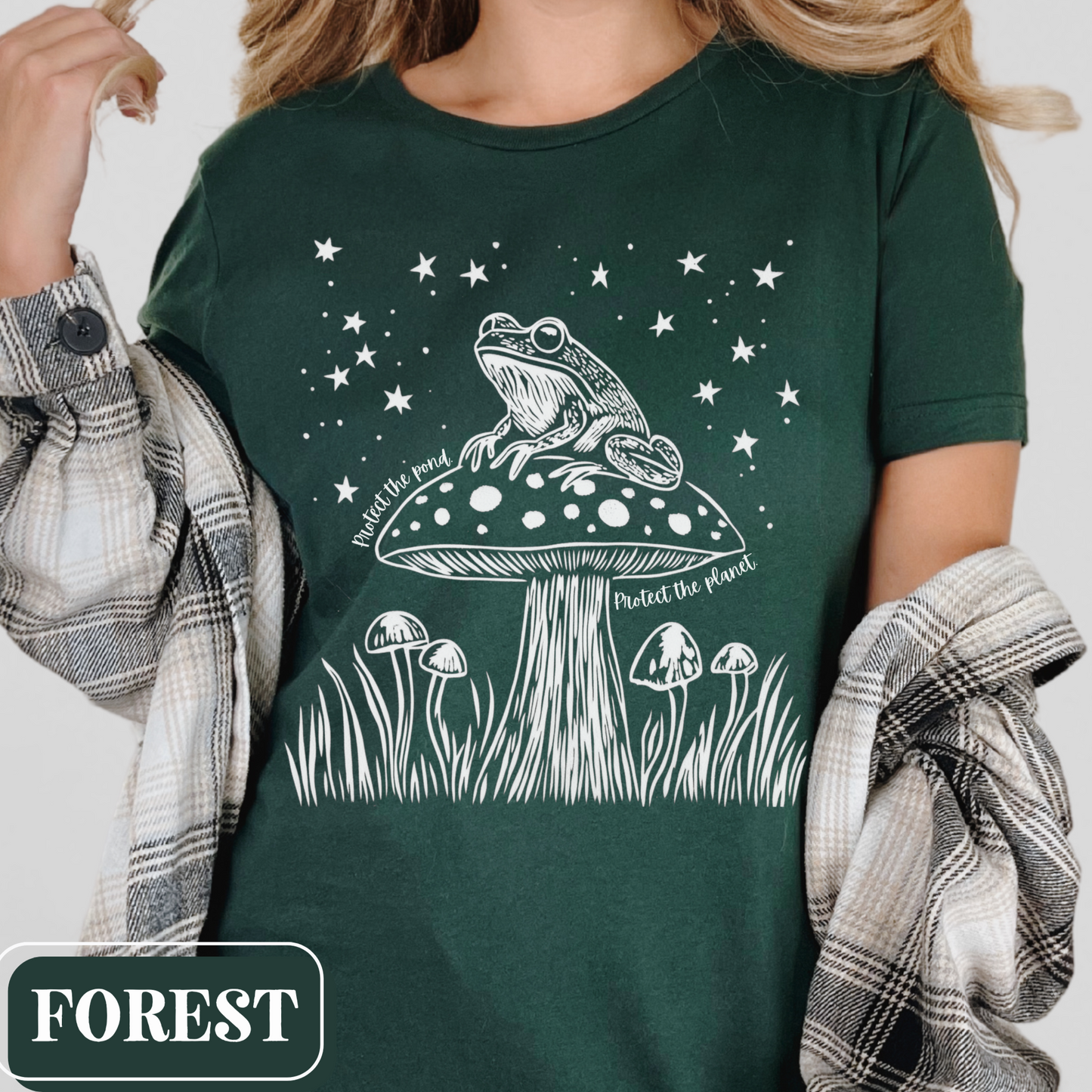 Forest Bella Canvas 3001 T-shirt with a large frog core graphic and starry night sky. It says "Protect the pond, protect the planet" - perfect gift for the amphibian lover, weirdcore environmentalist in your life.