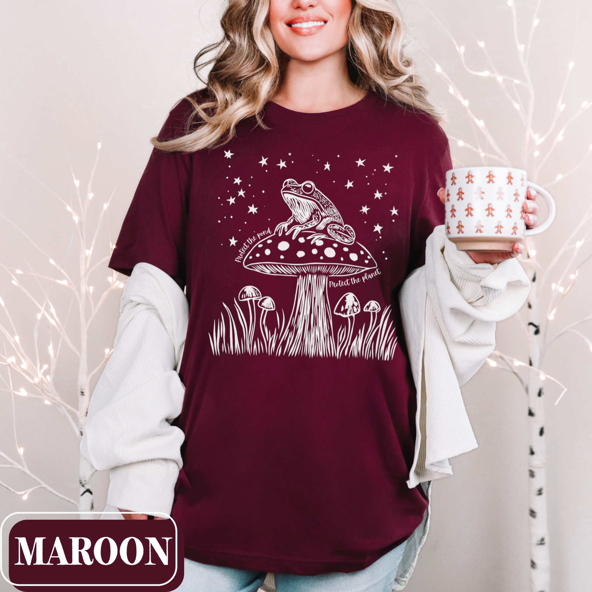 Maroon Bella Canvas 3001 T-shirt with a large frog core graphic and starry night sky. It says "Protect the pond, protect the planet" - perfect gift for the amphibian lover, weirdcore environmentalist in your life.