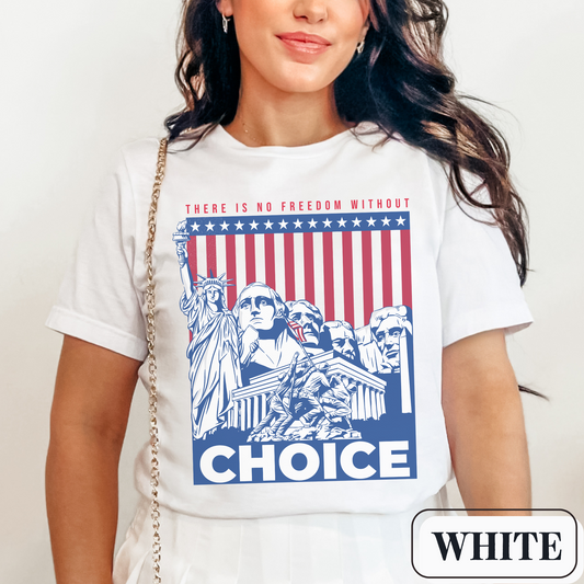 White Bella Canvas 3001 T-shirt with a patriotic design featuring the Statue of Liberty, Mount Rushmore, and an American Flag with soldiers. Women's fight for freedom is still ongoing - join us in advocating for a woman's right to choose and bodily autonomy. Support Roe V Wade.