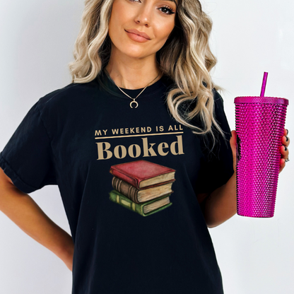 This black comfort colors tee is a must-have for anyone who loves curling up with their favorite novels.