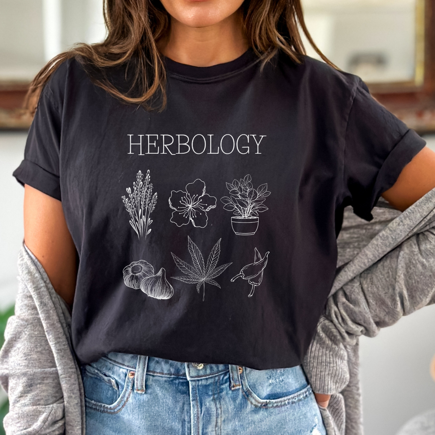Enchanted plants t-shirt inspired by Herbology class at hogwarts. Perfect for any witch or wizard with a green thumb, color is black.
