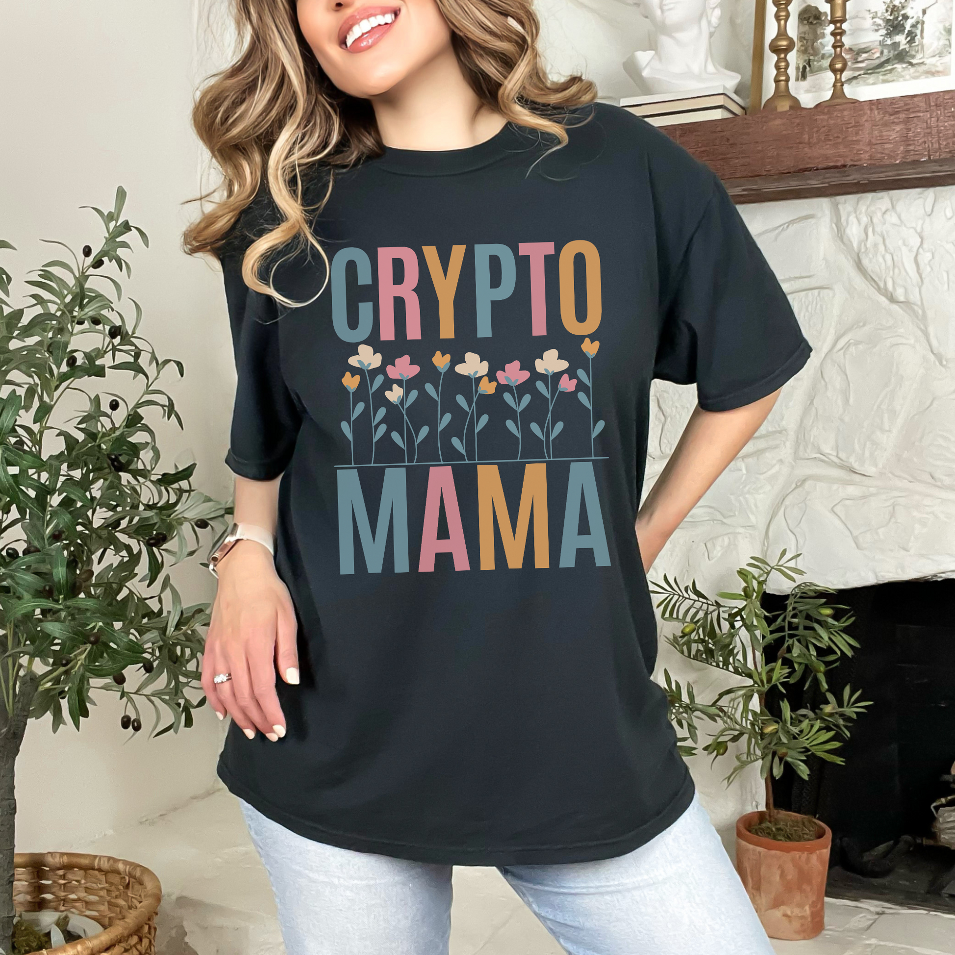 Black Comfort Colors 1717 T-shirt that says "Crypto Mama" with a color set of flowers. Perfect gift for your wife, girlfriend, sister, or friend that works in finance and supports crypto currency. The future of banking is blockchain.