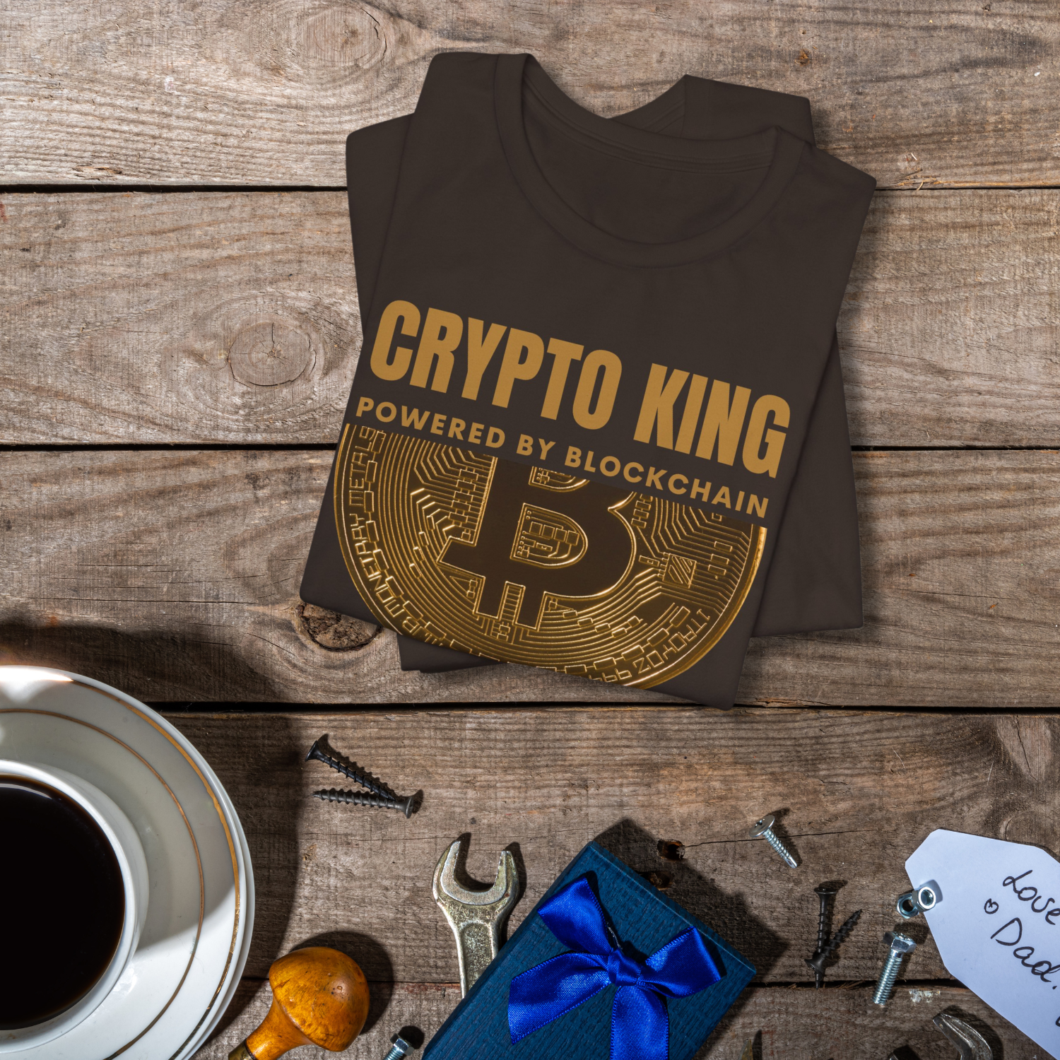 Brown Bella Canvas 3001 t-shirt with Crypto King design. Features a large Bitcoin, powered by blockchain merch.