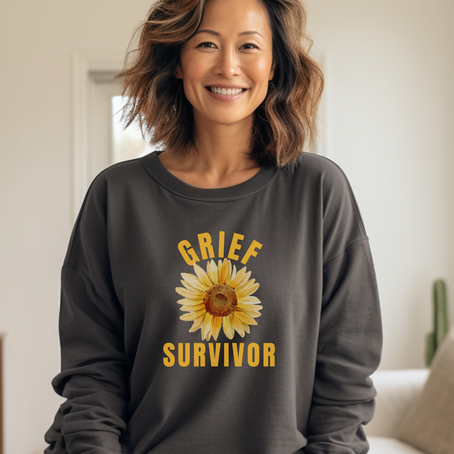 Pepper Comfort Colors 1566 Sweatshirt with sunflower design and a simple, compassionate message: You are a survivor, and you are experiencing the devastatingly unique emotions of lost love and deep sorrow. 