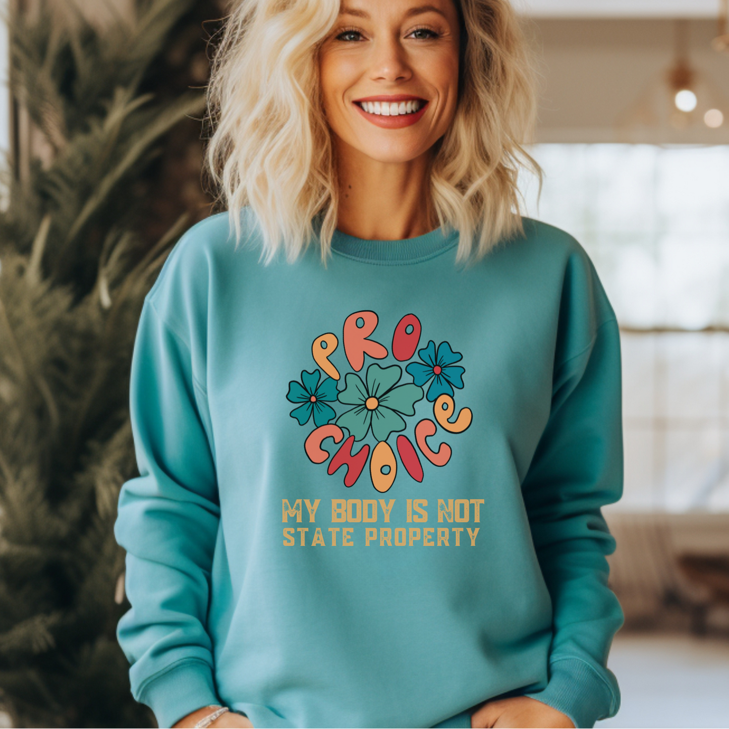 Stay warm and vocal with our seafoam-colored pro-choice message sweatshirt. Order in the same or matching colors for your friends or women's organizations.