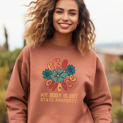 Celebrate choice and comfort with this empowering sweatshirt in a beautiful terracotta color. The trendy retro design frames a consequential and important message. 