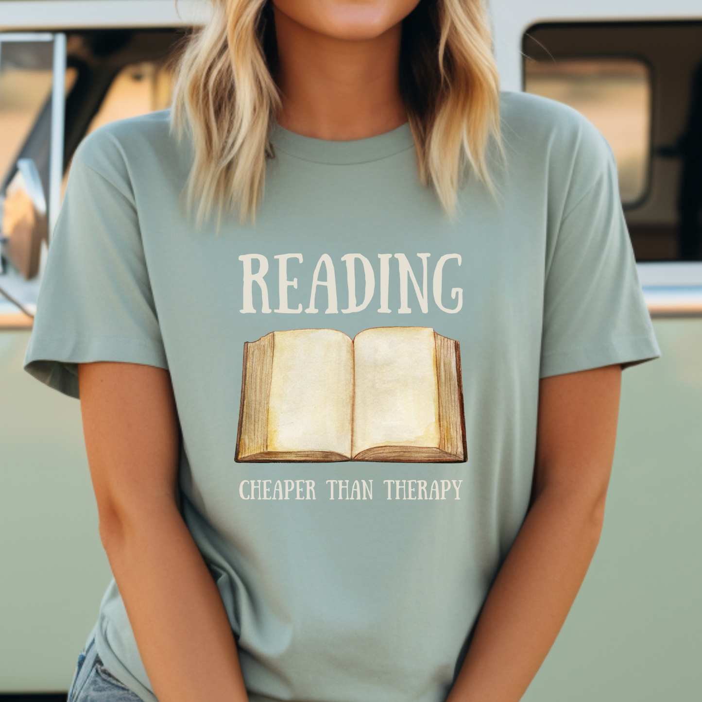 This dusty blue tee is a comfy addition to any bibliophile's apparel, who appreciates the fact that reading really is the best therapy.