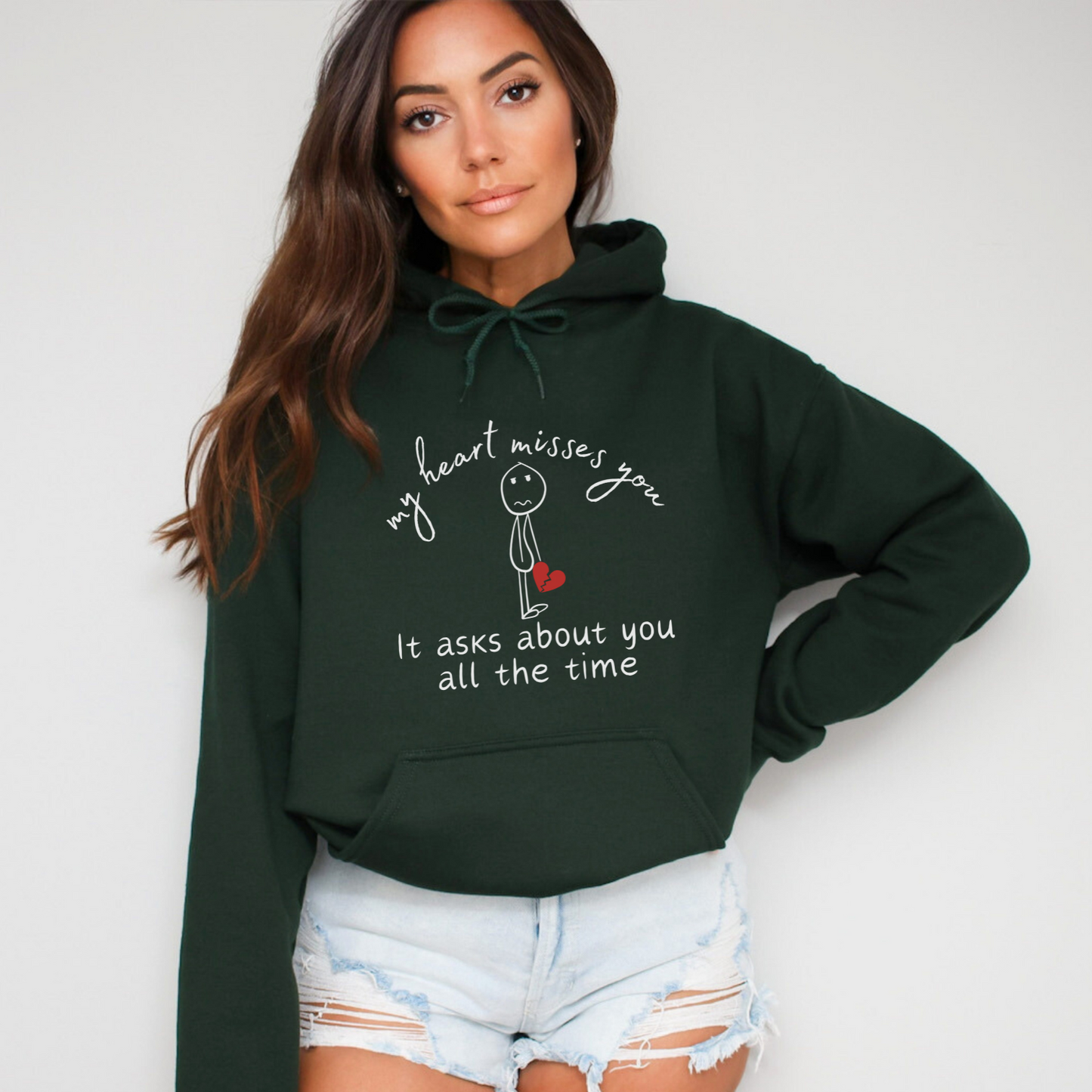 Forest Green hoodie sweatshirt - a warm embrace for those grieving a loss. "My heart misses you, it asks about you all the time" with a lonely stick figure with a broken heart.