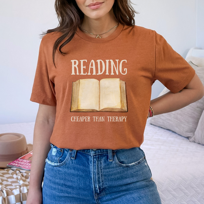 The beautiful heather autumn color of this tee mirrors the warm sensation of fall with the relaxing feeling of a captivating book. Reading really is the best therapy.
