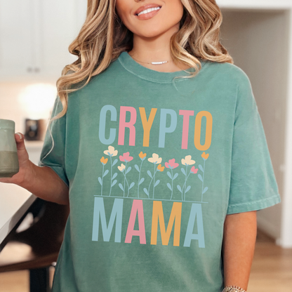 Light Green Comfort Colors 1717 T-shirt that says "Crypto Mama" with a color set of flowers. Perfect gift for your wife, girlfriend, sister, or friend that works in finance and supports crypto currency. The future of banking is blockchain.