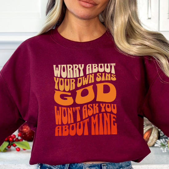 Maroon Gildan 18000 sweatshirt: Worry About Your Own Sins. God won't ask you about mine! Mind yours. I'll mind mine. 