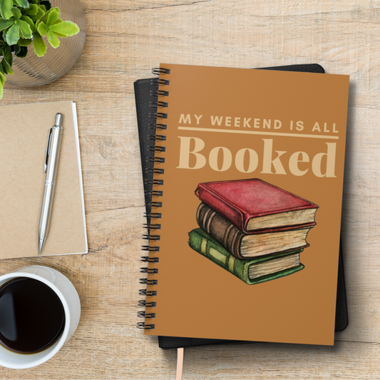 Brown literary-themed spiral notebook that's perfect for booklovers who enjoy documenting their reading journeys. 