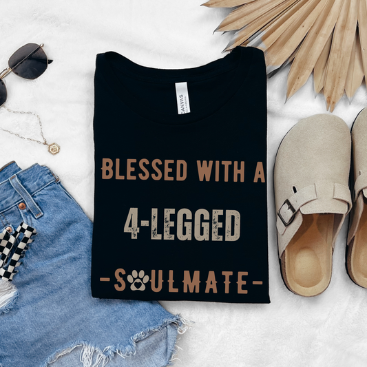 Black Bella Canvas 3001 T-Shirt that says "Blessed With A 4-Legged Soulmate" - perfect gift for dog or cat moms, pet owners and lovers, anyone that cares for animals - veterinarian, vet tech, rescue workers.