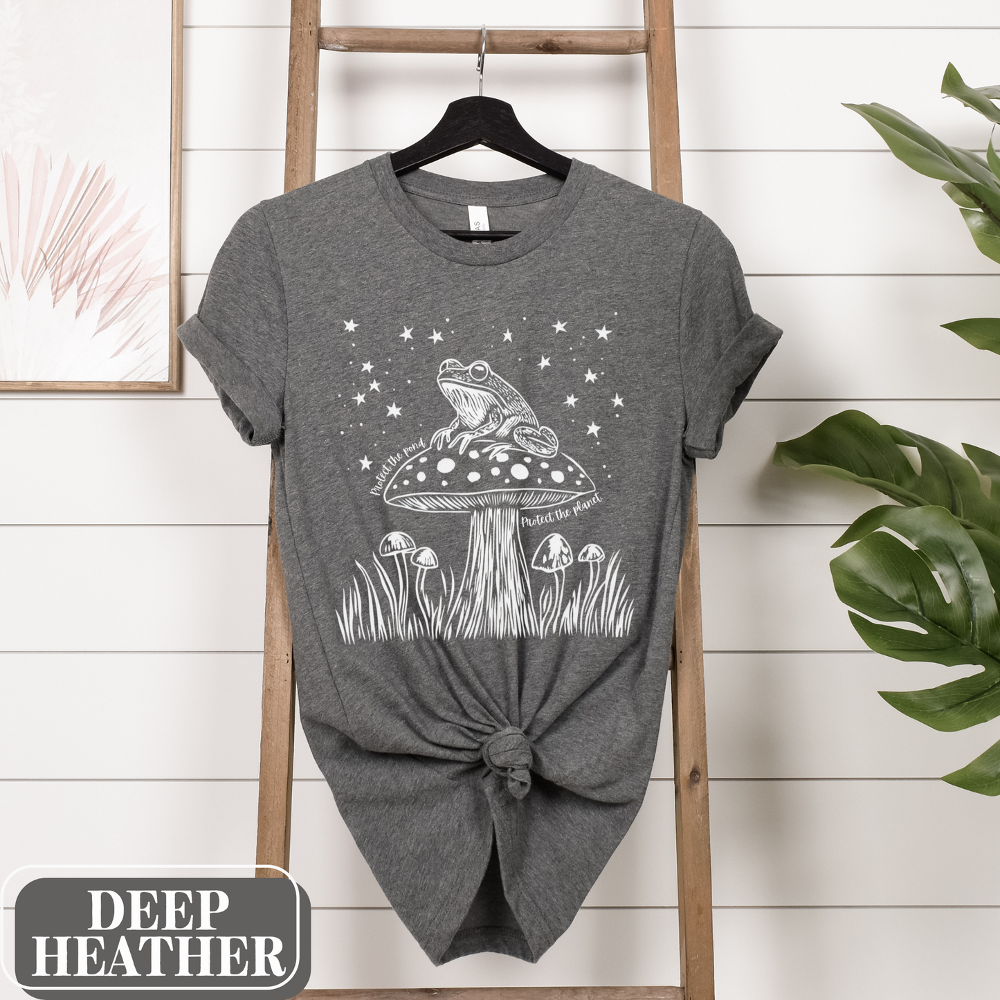 Deep Heather Bella Canvas 3001 T-shirt with a large frog core graphic and starry night sky. It says "Protect the pond, protect the planet" - perfect gift for the amphibian lover, weirdcore environmentalist in your life.