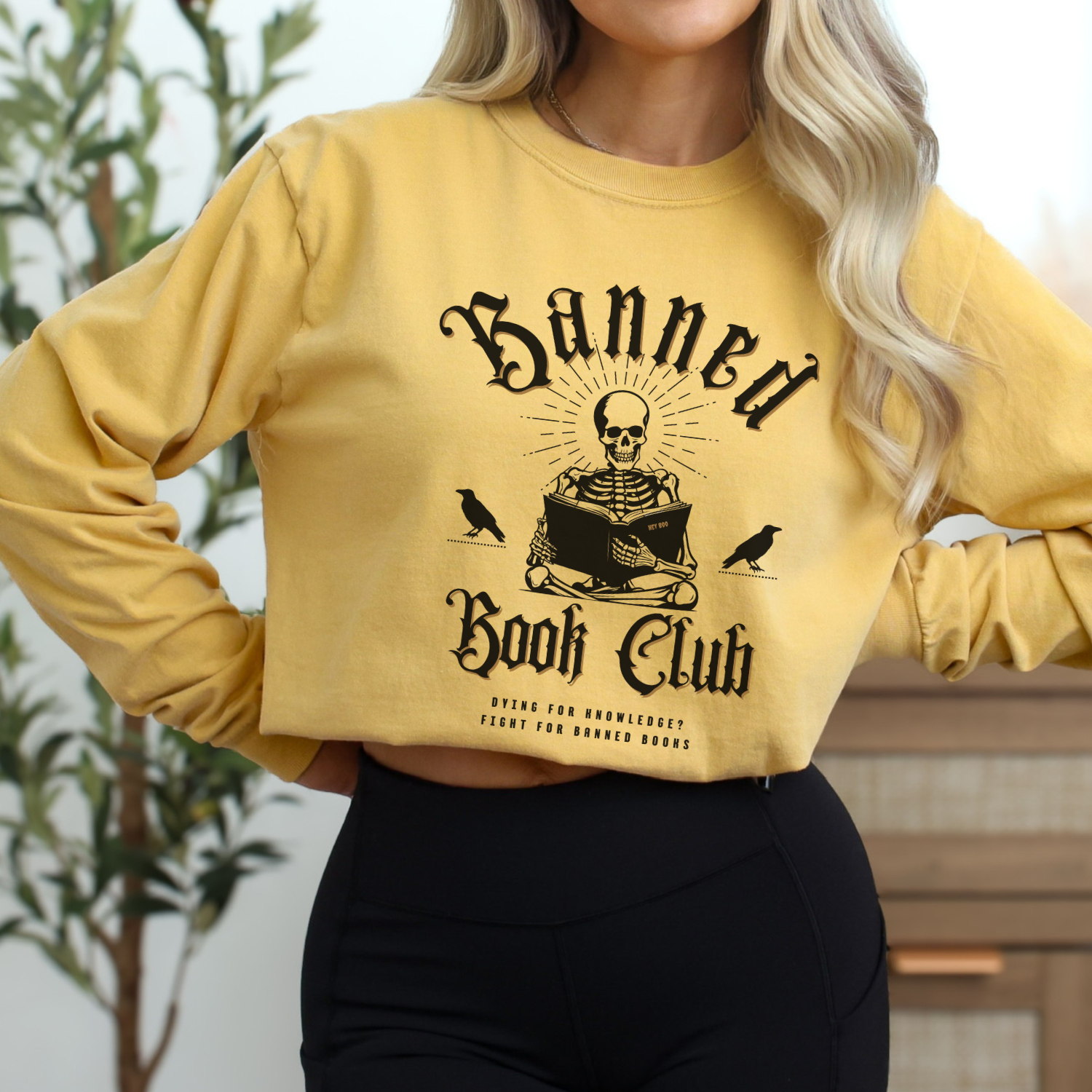 Mustard - Banned Book Club Comfort Colors long-sleeve t-shirt for reading lover. Has a spooky graphic of a skeleton reading and says "Dying for knowledge? Fight for banned books."  Perfect gift for avid readers, literary enthusiasts, English majors and librarians.