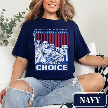 Navy Bella Canvas 3001 T-shirt with a patriotic design featuring the Statue of Liberty, Mount Rushmore, and an American Flag with soldiers. Women's fight for freedom is still ongoing - join us in advocating for a woman's right to choose and bodily autonomy. Support Roe V Wade.