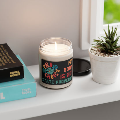 White scented soy candle with a pro-choice message in a colorful retro design. Available in 9 scents.
