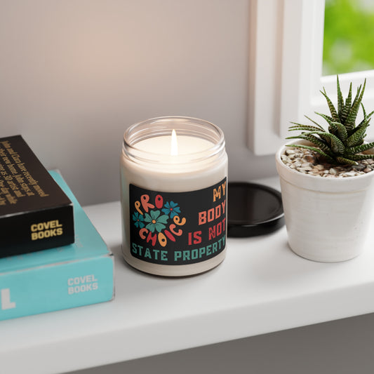 White scented soy candle with a pro-choice message in a colorful retro design. Available in 9 scents.