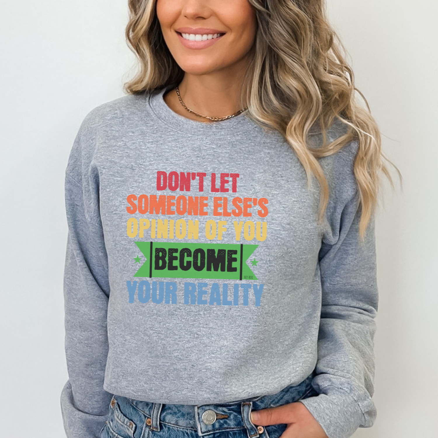 Sport Gray Gildan 18000 Sweatshirt with a meaningful directive to live your life authentically, without regard for how others might try to influence your self-worth or chosen path. 