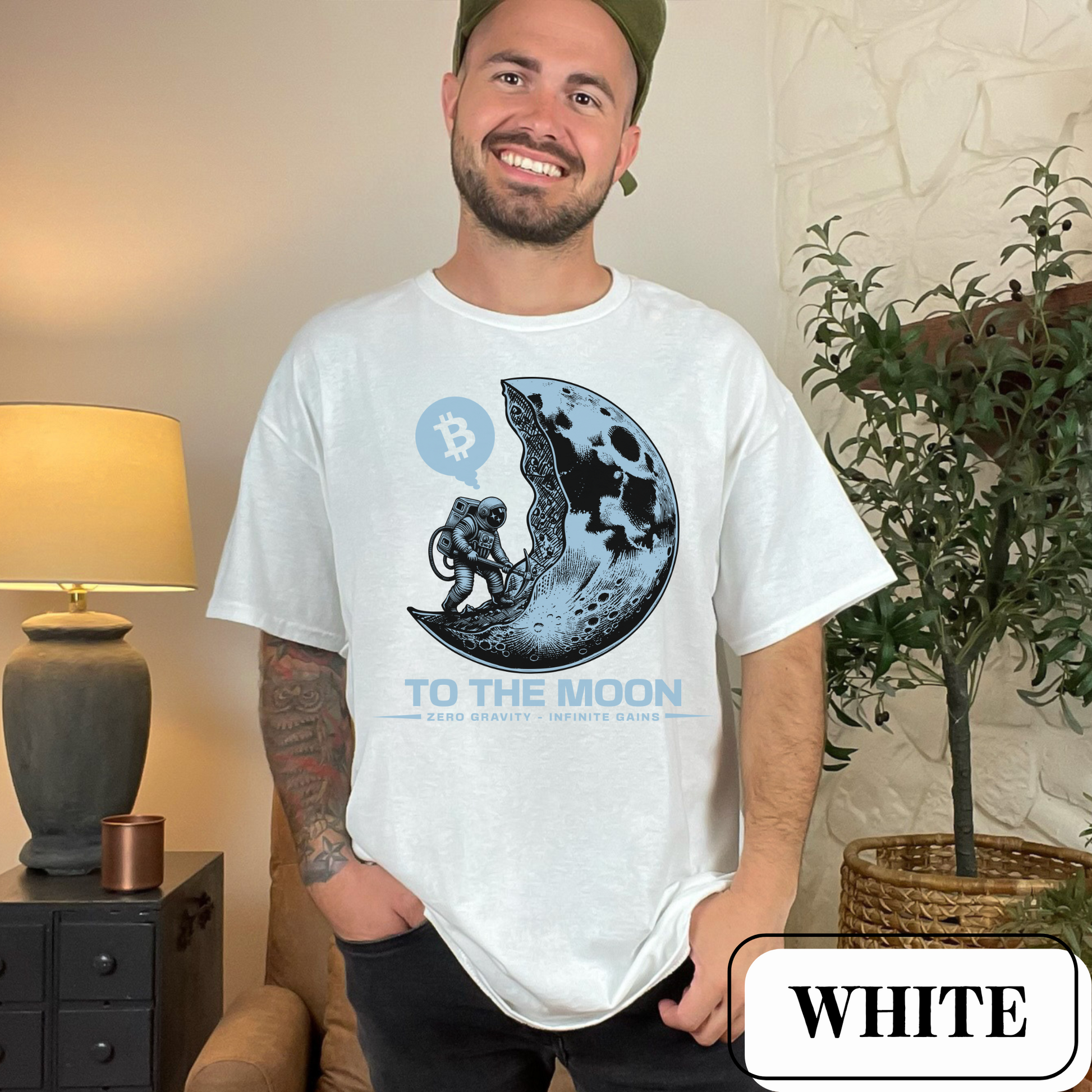 White Comfort Colors 1717 T-Shirt with a large, edgy graphic of a moon and someone mining bitcoin. Perfect gift for crypto currency enthusiasts, traders, investors, and BTC lovers.